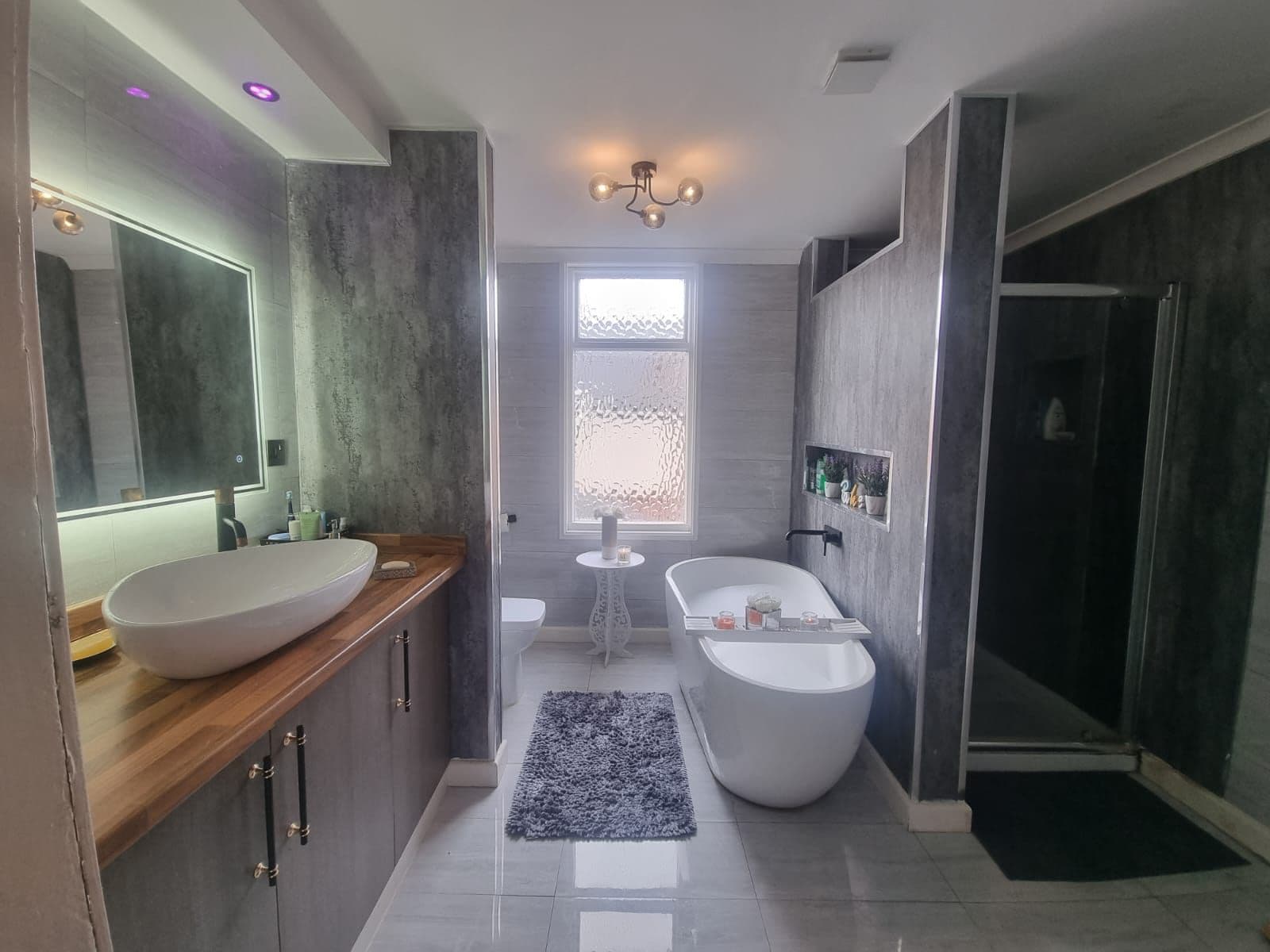 Luxury bathroom with freestanding bath and walk-in shower — project example 2