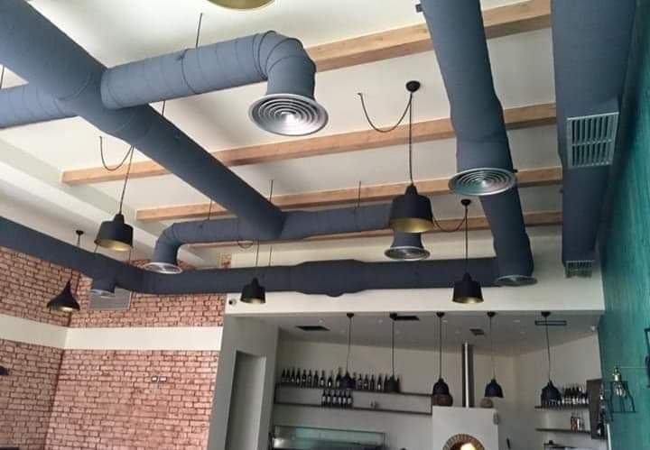 Finished retail shop fit-out with bespoke display shelving — project example 2