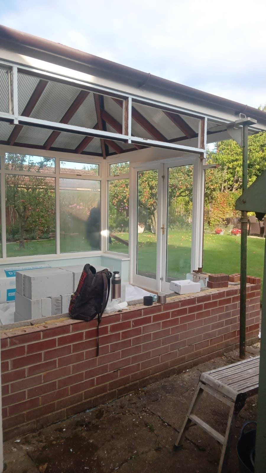 Roof trusses under construction on a UK house extension — project example 3