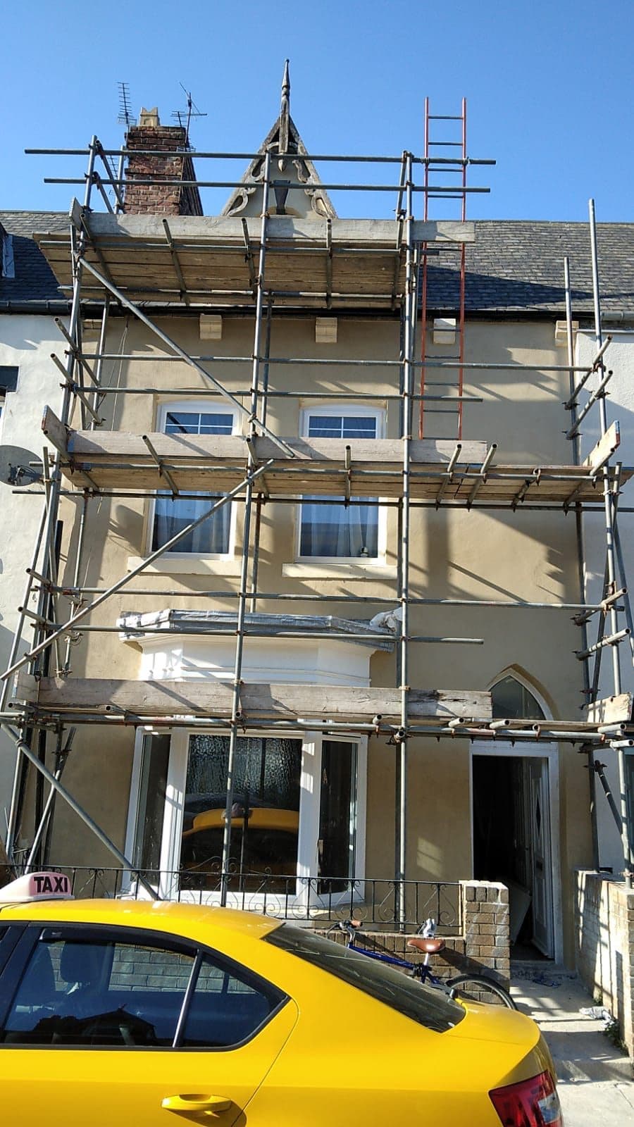 Close-up of freshly rendered brickwork and a window reveal on a UK property — project example 1