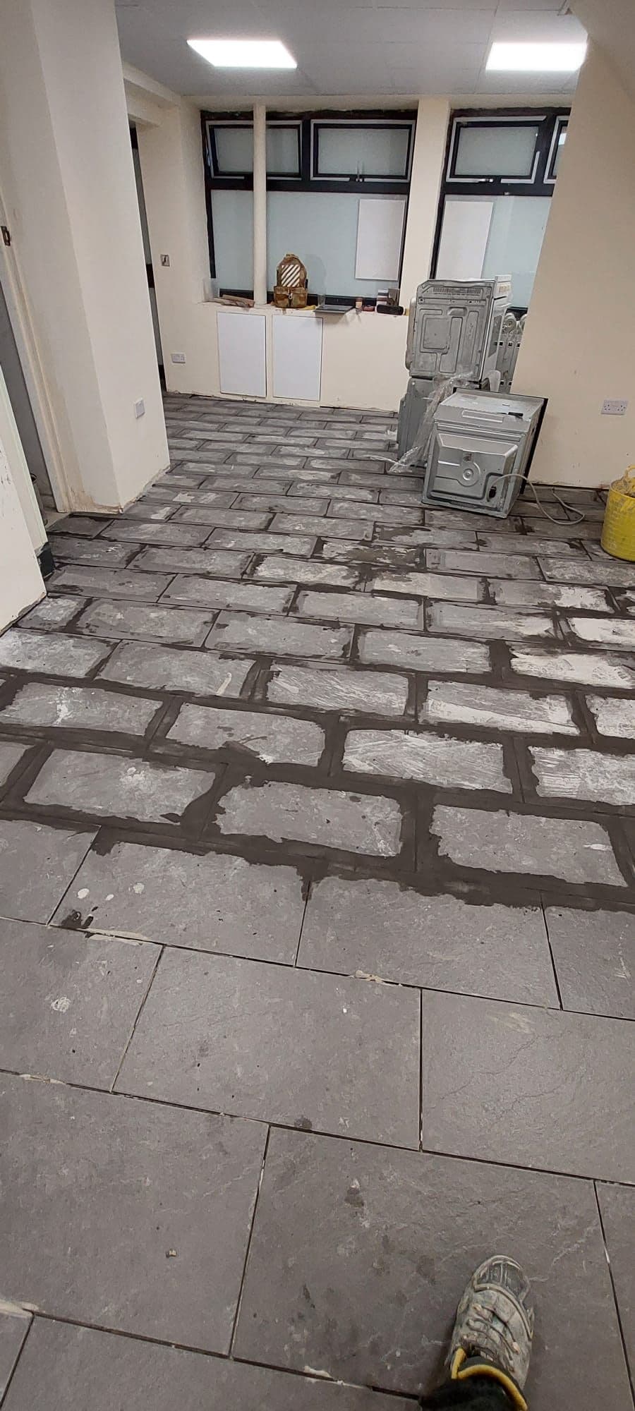 Plastering materials and tools set out during a general building project in a UK home — project example 1