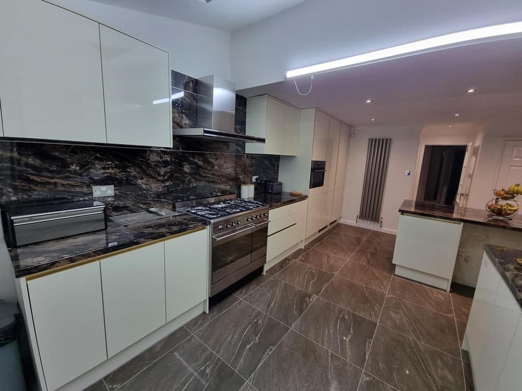 Finished bespoke kitchen with French doors onto the garden — project example 1