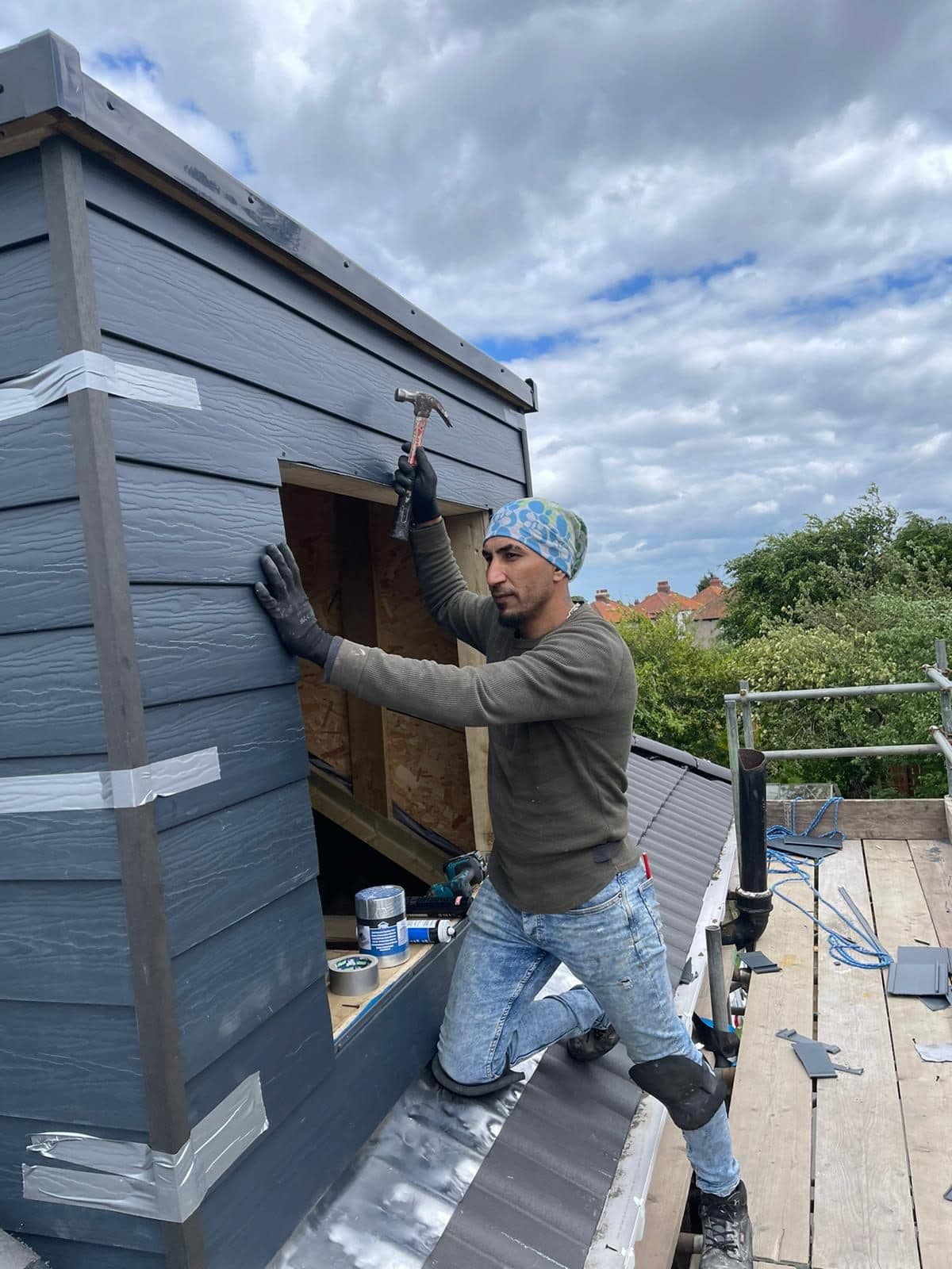 Finished natural slate roof with chimney on a UK home — project example 2